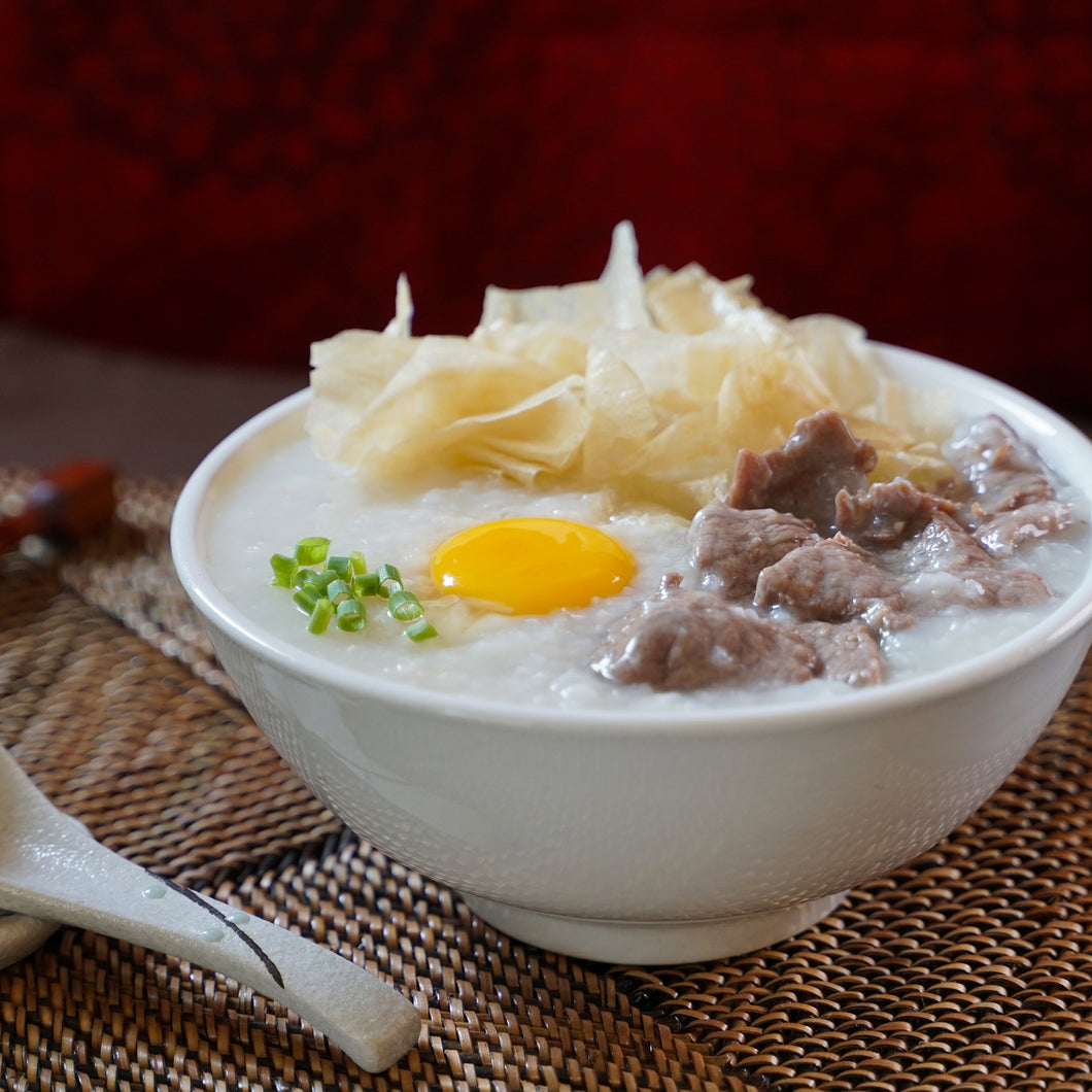 Sliced Beef Congee (comes with raw egg, fried chips and scallions)